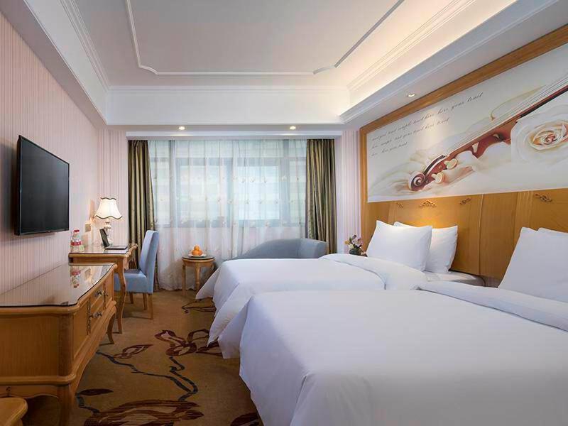 Vienna International Hotel Fenghua Zhongshan Road Экстерьер фото