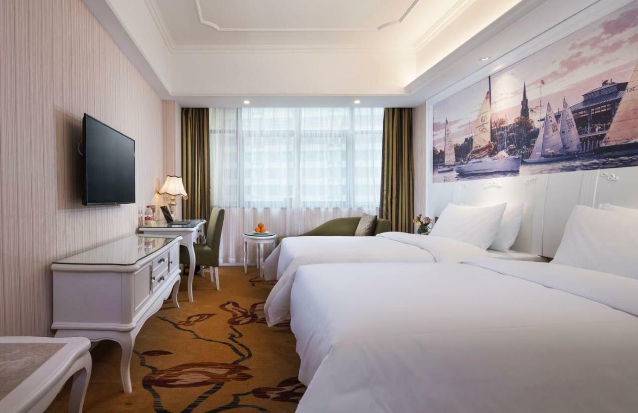 Vienna International Hotel Fenghua Zhongshan Road Экстерьер фото